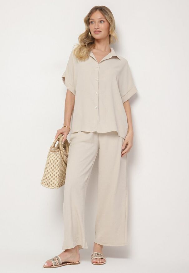 Born2be - Jasnobeżowy Komplet Koszula z Krótkim Rękawem i Szerokie Spodnie Maralissa. Kolor: beżowy