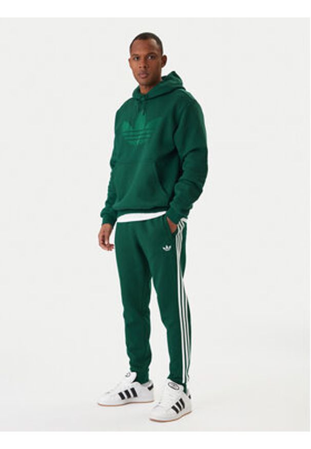 Adidas - adidas Spodnie dresowe 3-Stripes KE3559 Zielony Slim Fit. Kolor: zielony. Materiał: bawełna, syntetyk