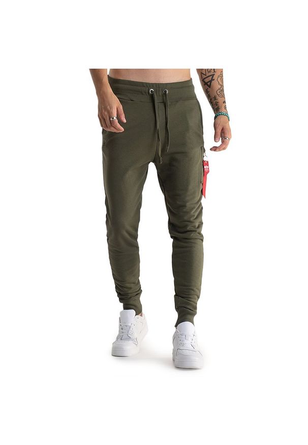 Spodnie Alpha Industries X-Fit Slim Cargo 178333257 - zielone. Kolor: zielony. Materiał: bawełna, poliester, dresówka, materiał. Wzór: aplikacja