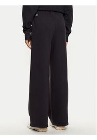 Champion Spodnie dresowe 117661 Czarny Wide Leg. Kolor: czarny. Materiał: bawełna #4