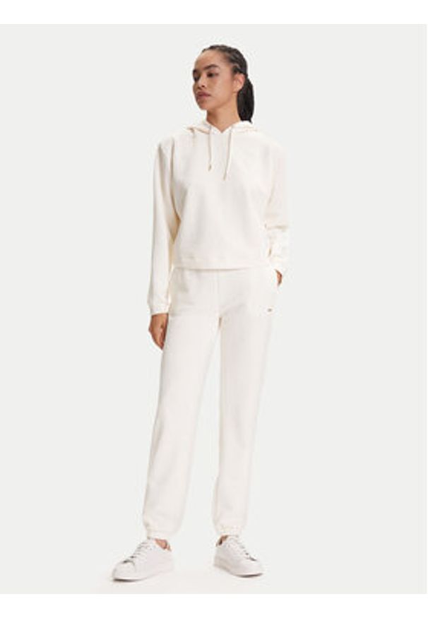 Guess Spodnie dresowe V5YB06 KBSL2 Écru Regular Fit. Materiał: syntetyk