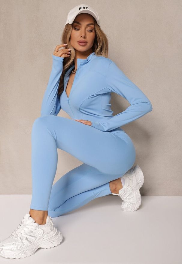 Renee - Jasnoniebieski Komplet Sportowy Legginsy i Bluza z Wycięciem na Kciuk Redarose. Kolor: niebieski