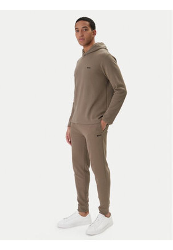 BOSS Spodnie dresowe Waffle 50535878 Brązowy Regular Fit. Kolor: brązowy. Materiał: bawełna, syntetyk
