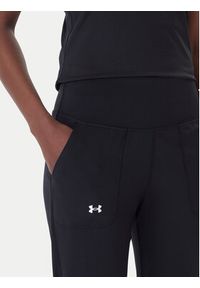 Under Armour Spodnie dresowe Motion 1375077 Czarny Slim Fit. Kolor: czarny. Materiał: syntetyk #4