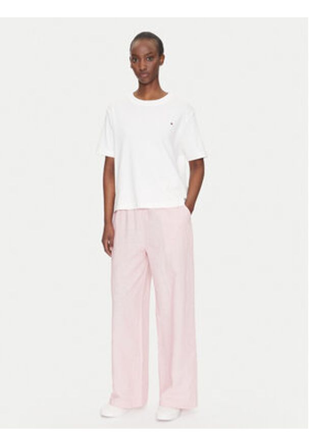 Tommy Jeans Spodnie materiałowe DW0DW20352 Różowy Regular Fit. Kolor: różowy. Materiał: bawełna