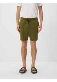 Reserved - Szorty comfort z przeszyciami - jasny zielony. Kolor: zielony. Materiał: bawełna, dzianina #1