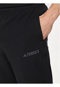 Adidas - adidas Spodnie outdoor Terrex Multi IN4604 Czarny Loose Fit. Kolor: czarny. Materiał: syntetyk. Sport: outdoor