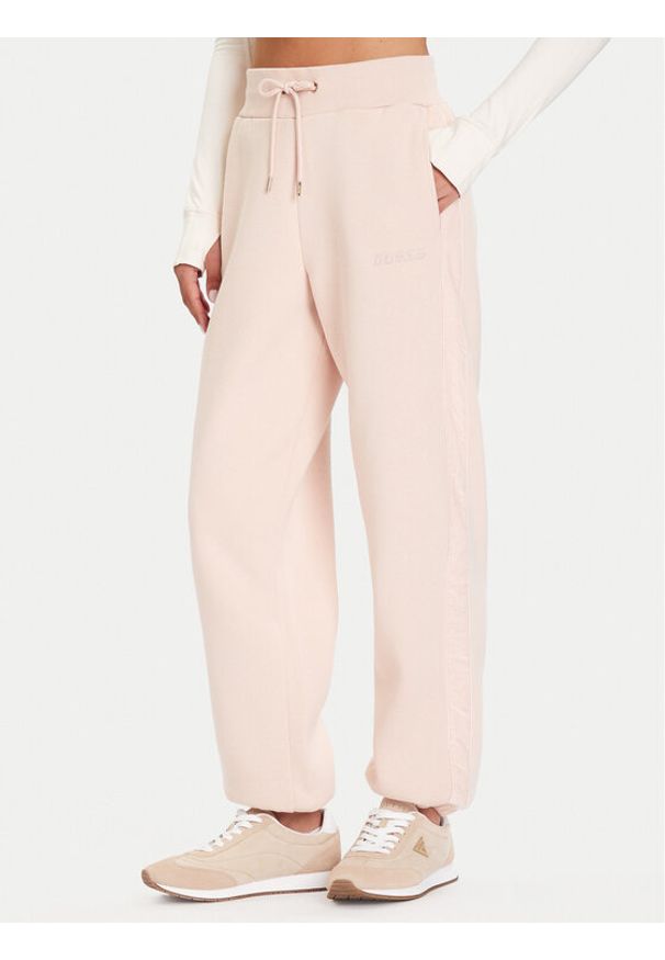 Guess Spodnie dresowe V5BB10 KB681 Różowy Regular Fit. Kolor: różowy. Materiał: bawełna, syntetyk