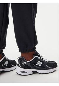 New Balance Spodnie dresowe Essentials WP41500 Czarny Relaxed Fit. Kolor: czarny. Materiał: syntetyk, bawełna #5