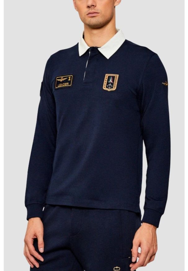 Aeronautica Militare - AERONAUTICA MILITARE Granatowy bawełniany męski longsleeve polo, Rozmiar L. Okazja: na co dzień. Typ kołnierza: polo. Kolor: niebieski. Materiał: bawełna. Długość rękawa: długi rękaw. Wzór: haft. Styl: casual, sportowy