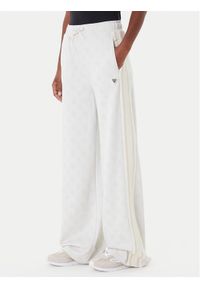 Guess Spodnie dresowe V5YB10 K0282 Écru Relaxed Fit. Materiał: syntetyk