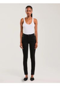 Big-Star - Jeansy damskie skinny czarne Adela 915. Okazja: do domu. Kolor: czarny. Długość: długie