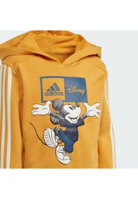 Adidas - Zestaw adidas x Disney Mickey Mouse Hoodie and Jogger. Kolor: biały, żółty, wielokolorowy. Materiał: dresówka. Wzór: motyw z bajki