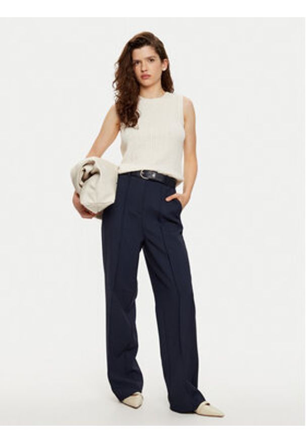 TOMMY HILFIGER - Tommy Hilfiger Spodnie materiałowe WW0WW43875 Granatowy Regular Fit. Kolor: niebieski. Materiał: syntetyk