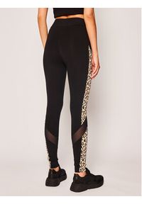 Puma Legginsy CHARLOTTE OLYMPIA Co Tights 596764 Czarny Slim Fit. Kolor: czarny. Materiał: bawełna