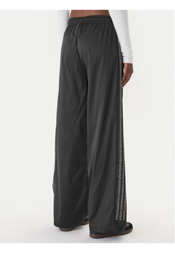 Adidas - adidas Spodnie dresowe Pearl Firebird KC7863 Czarny Loose Fit. Kolor: czarny. Materiał: syntetyk