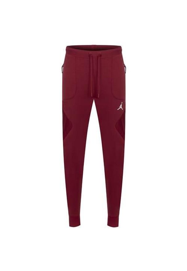 Spodnie sportowe męskie Nike Jordan. Kolor: czerwony. Materiał: bawełna, syntetyk, materiał. Długość: długie