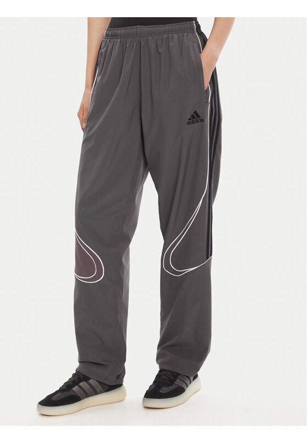 Adidas - adidas Spodnie dresowe Teamgeist adicolor JW5870 Szary Loose Fit. Kolor: szary. Materiał: syntetyk