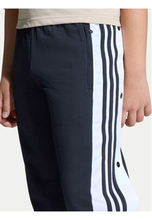 Adidas - adidas Spodnie dresowe Adibreak KD3989 Czarny Regular Fit. Kolor: czarny. Materiał: syntetyk