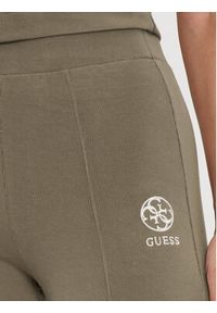 Guess Spodnie materiałowe Elea V4YB01 KCDN0 Brązowy Slim Fit. Kolor: brązowy. Materiał: wiskoza