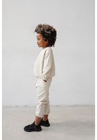 Marsala - MINI spodnie dresowe typu jogger w kolorze BEIGE z dodatkiem konopii - DISPLAY KONOPIA-92-98 (2-3). Stan: podwyższony. Kolor: beżowy. Materiał: dresówka. Wzór: gładki #1