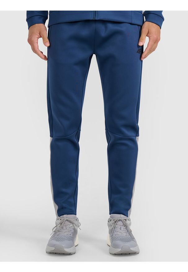 4f - 4F Spodnie treningowe szybkoschnące męskie - niebieskie 3XL. Kolor: niebieski. Materiał: tkanina, materiał, syntetyk, włókno, elastan. Sport: fitness