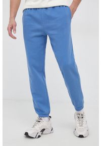 GAP Spodnie męskie gładkie. Kolor: niebieski. Materiał: dzianina, poliester. Wzór: gładki