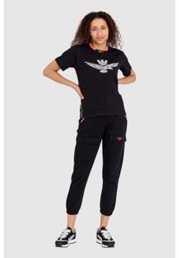 Aeronautica Militare - AERONAUTICA MILITARE Czarny luźny t-shirt damski z wypukłym orłem Comfort Fit. Kolor: czarny. Materiał: bawełna #4
