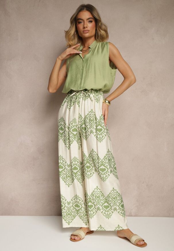 Renee - Zielone Spodnie z Wiskozy o Szerokim Kroju High Waist ze Wzorem Boho Neolissea. Okazja: na spacer, na co dzień. Stan: podwyższony. Kolor: zielony. Materiał: wiskoza. Sezon: lato. Styl: boho