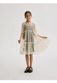 Reserved - Tiulowa sukienka w groszki - kremowy. Kolor: kremowy. Materiał: tiul. Wzór: grochy. Typ sukienki: w kształcie A