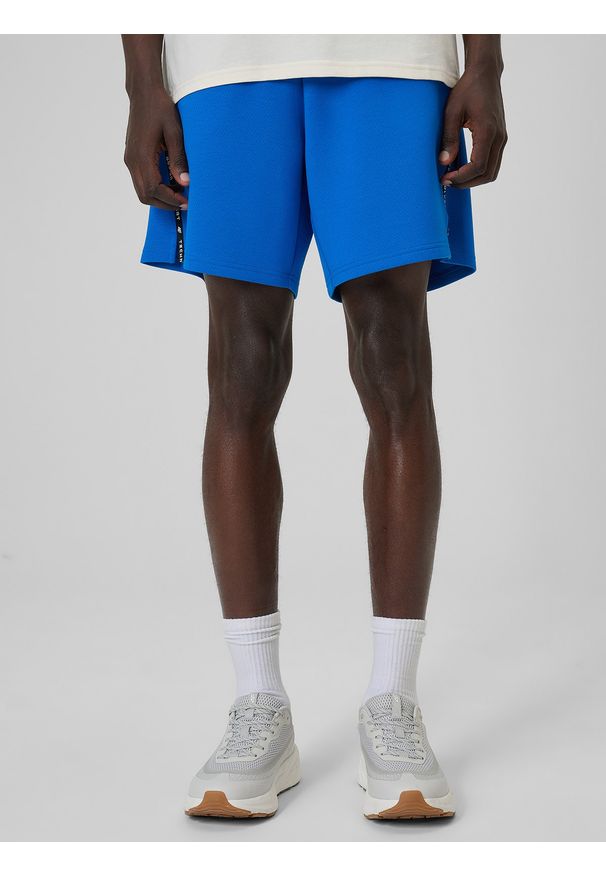 4f - 4F Spodenki dresowe męskie - niebieskie S. Kolor: niebieski. Materiał: dresówka. Długość: do kostek. Sport: fitness