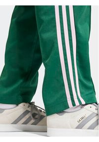 Adidas - adidas Spodnie dresowe adicolor Classics SST IM9818 Zielony Loose Fit. Kolor: zielony. Materiał: bawełna #2