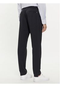 TOMMY HILFIGER - Tommy Hilfiger Chinosy Chelsea MW0MW33933 Granatowy Slim Fit. Kolor: niebieski. Materiał: bawełna