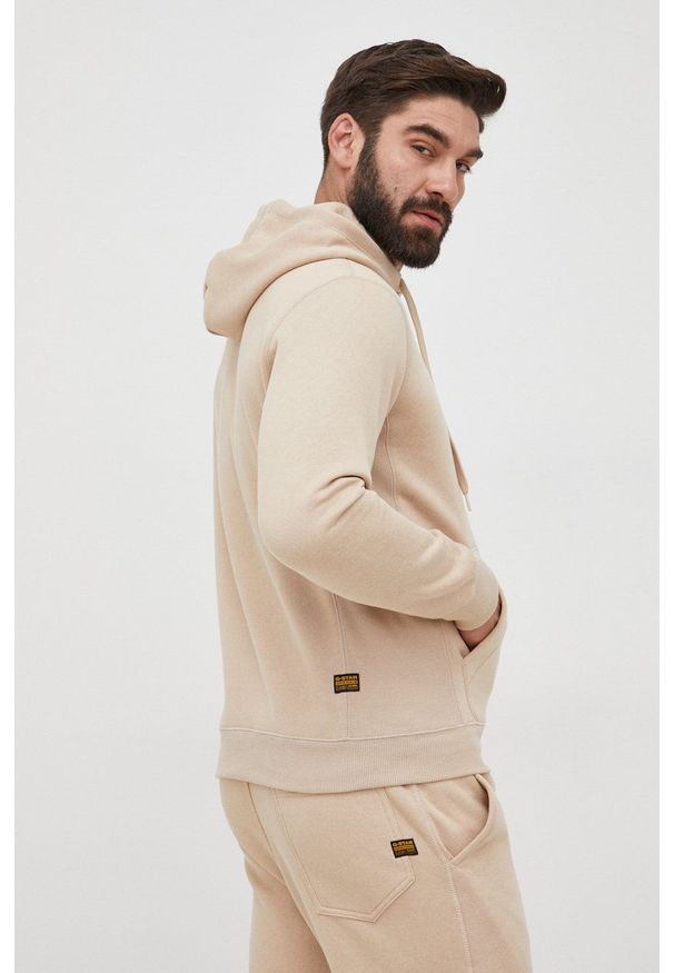 G-Star RAW - G-Star Raw bluza męska kolor beżowy z kapturem gładka. Okazja: na co dzień. Typ kołnierza: kaptur. Kolor: beżowy. Materiał: włókno, materiał, dzianina. Wzór: gładki. Styl: casual