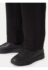 Hugo - HUGO Spodnie dresowe Danovopan 50546376 Czarny Relaxed Fit. Kolor: czarny. Materiał: bawełna