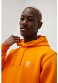 adidas Originals bluza męska kolor pomarańczowy z kapturem gładka. Okazja: na co dzień. Typ kołnierza: kaptur. Kolor: pomarańczowy. Materiał: bawełna. Wzór: gładki. Styl: casual