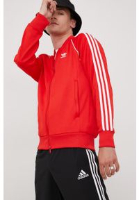 adidas Originals bluza HF2124 Adicolor Classics Primeblue SST Track Jacket męska kolor czerwony z aplikacją HF2124-VIVRED. Okazja: na co dzień. Kolor: czerwony. Materiał: materiał. Długość rękawa: raglanowy rękaw. Wzór: aplikacja. Styl: casual #3