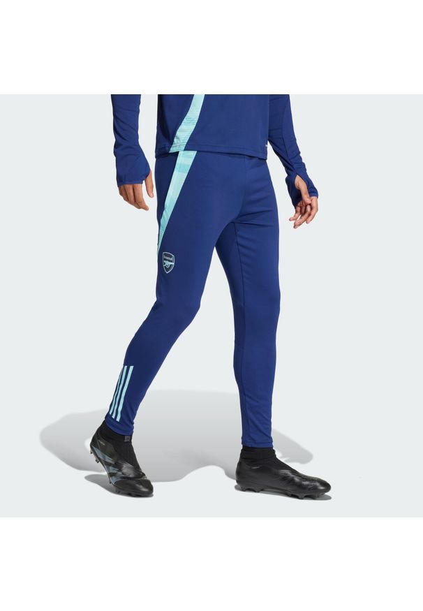 Adidas - Spodnie Arsenal Tiro 24 Training. Kolor: niebieski. Materiał: dresówka, materiał. Sport: piłka nożna
