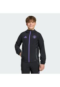Adidas - Bluza Manchester United Tiro 25 Competition Vis Tech Travel Kids. Kolor: fioletowy, wielokolorowy, czarny. Materiał: dresówka. Sport: piłka nożna