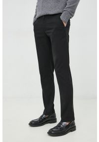 TOMMY HILFIGER - Tommy Hilfiger spodnie męskie kolor czarny w fasonie chinos. Kolor: czarny. Materiał: bawełna, włókno #1