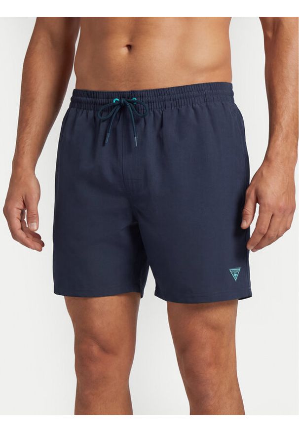 Guess Szorty kąpielowe F6GT24 WG282 MEDIUM Granatowy Regular Fit. Kolor: niebieski. Materiał: syntetyk