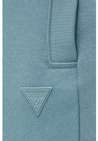 Guess spodnie dresowe kolor zielony melanżowe. Kolor: turkusowy. Materiał: dresówka. Wzór: melanż #3