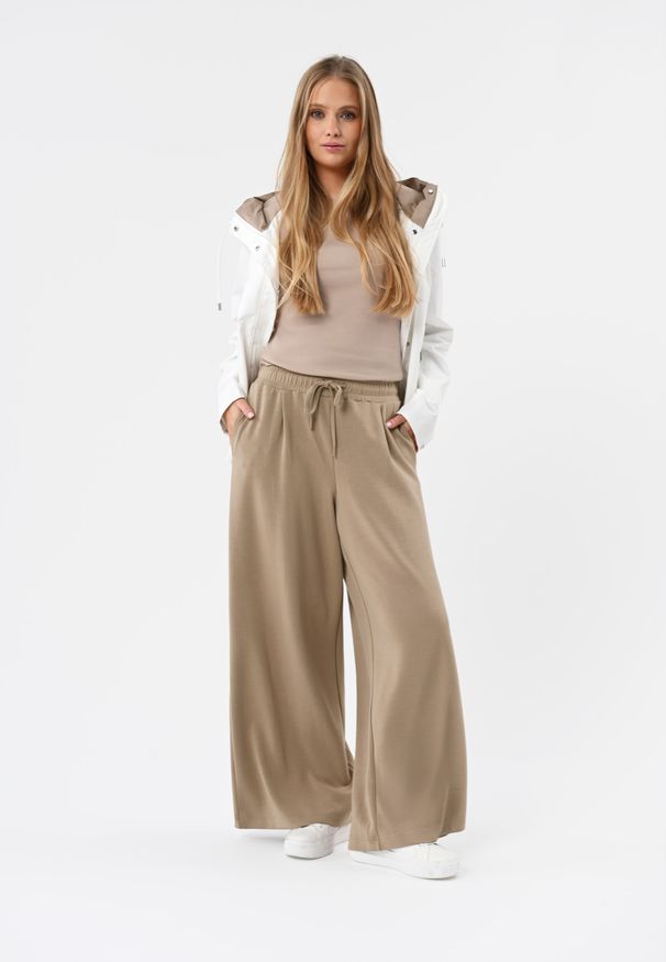 Volcano - Beżowe, luźne spodnie dresowe N-MOCK. Kolor: beżowy. Materiał: dresówka