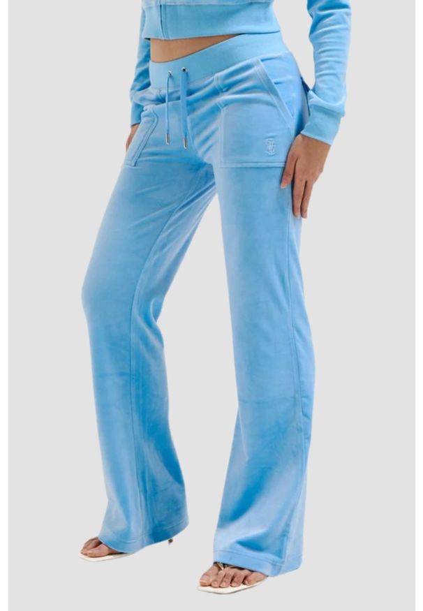 Juicy Couture - JUICY COUTURE Błękitne spodnie dresowe Del Ray Pocketed Pant. Kolor: niebieski. Materiał: dresówka