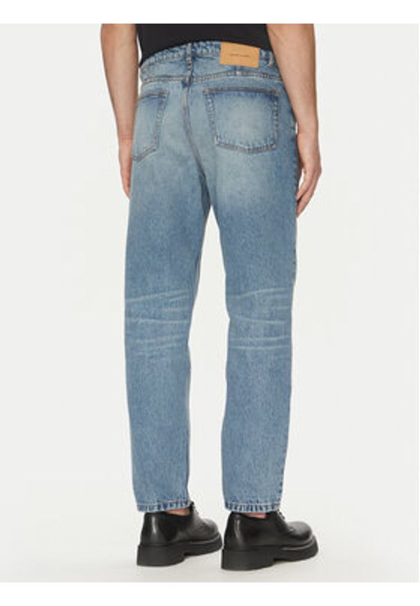 AMI PARIS - AMI Paris Jeansy HTR103.DE0046 Niebieski Tapered Fit. Kolor: niebieski