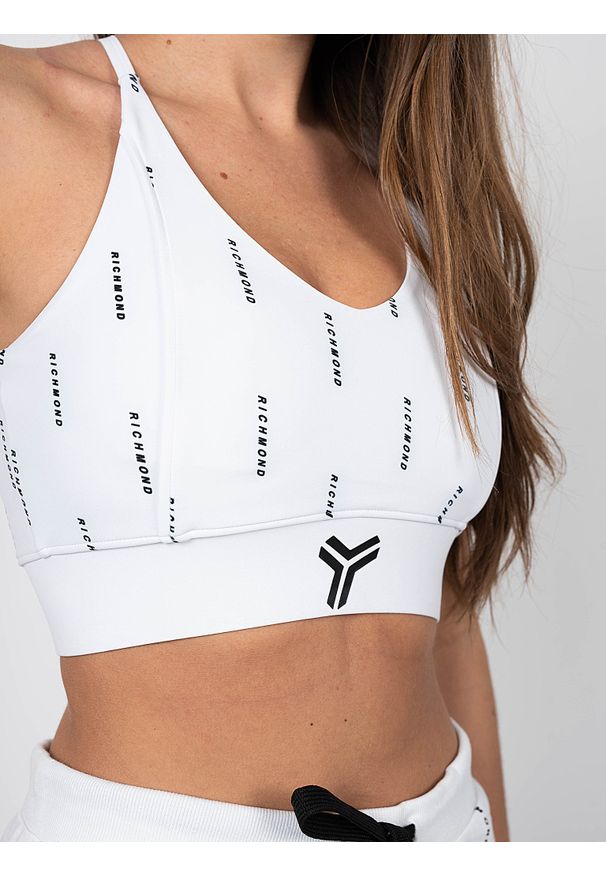 John Richmond - Richmond Sport Top "Fitness" | UWA22005TO | Fitness | Kobieta | Biały. Typ kołnierza: dekolt w kształcie V. Kolor: biały. Materiał: poliester, elastan. Długość rękawa: na ramiączkach. Styl: sportowy