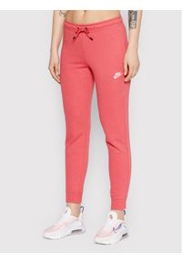 Nike Spodnie dresowe Essential BV4099 Różowy Slim Fit. Kolor: różowy. Materiał: bawełna, dresówka #1