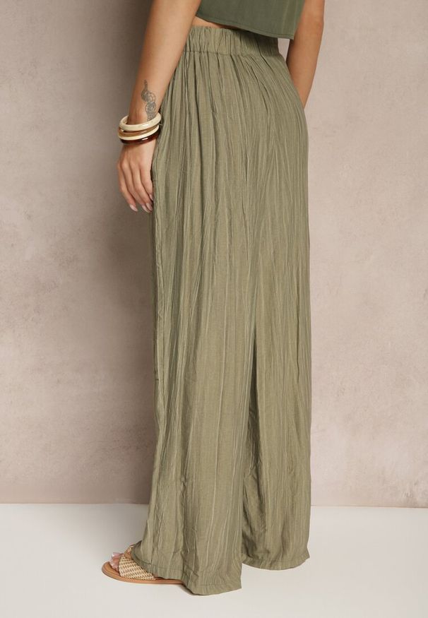 Renee - Ciemnozielone Spodnie o Szerokim Kroju High Waist Natoreia. Okazja: na co dzień. Stan: podwyższony. Kolor: zielony. Styl: elegancki, klasyczny, boho, casual