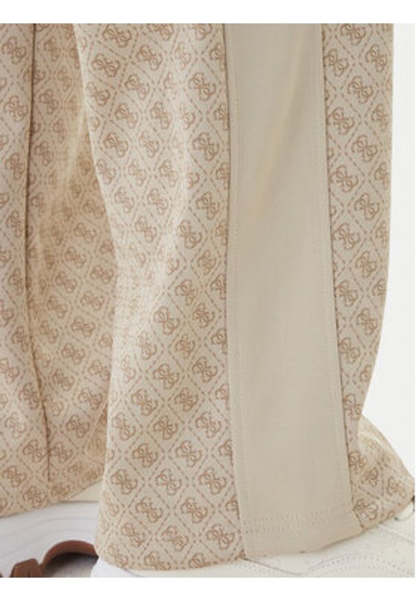 Guess Spodnie dresowe V6RB09 K2042 Beżowy Wide Leg. Kolor: beżowy. Materiał: syntetyk