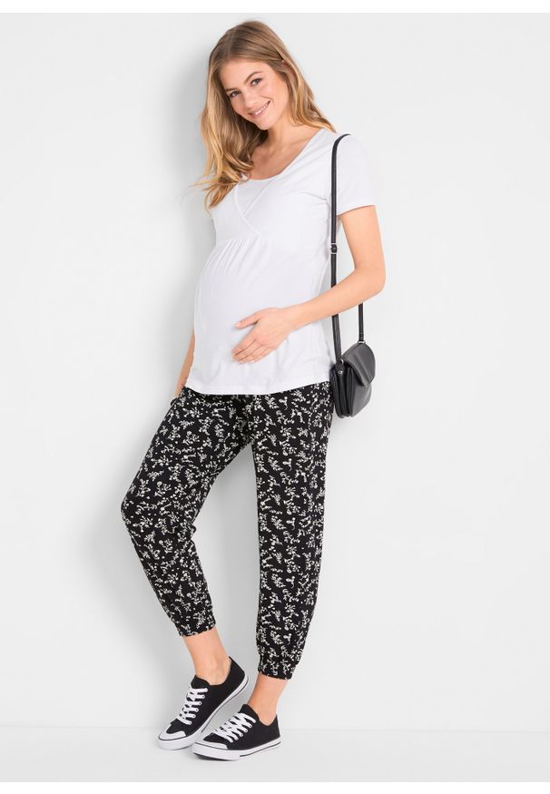 bonprix - Spodnie ciążowe Loose Fit. Kolekcja: moda ciążowa. Kolor: czarny. Materiał: materiał. Wzór: kwiaty, nadruk